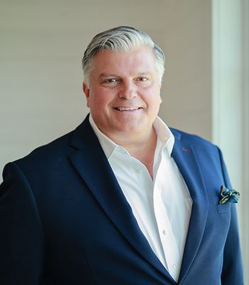 Portrait of John Cone, REALTOR® Associate.